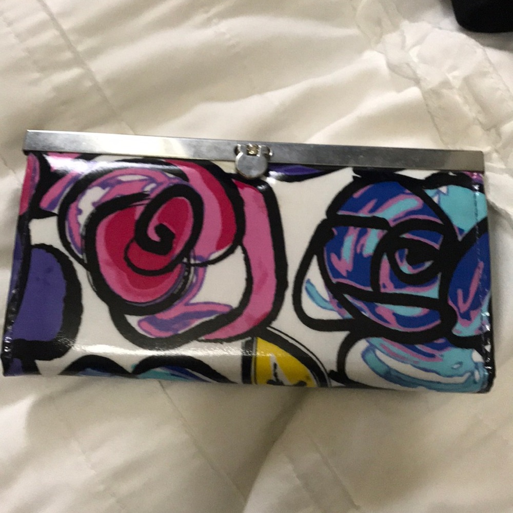 artsy floral leather clutch